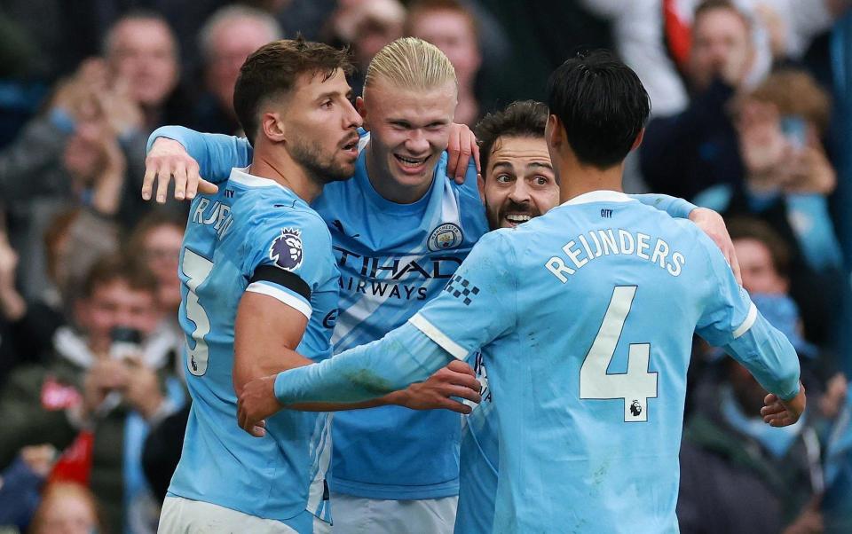 哈兰德是曼, com